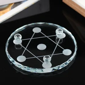 Close-up detail of transparent crystal seven star array base plate with facet cut edges.