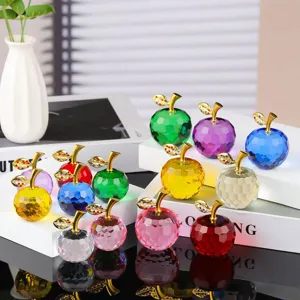 Colorful crystal apple figurine detail view, sparkling gemstone leaf decor for home and desk.