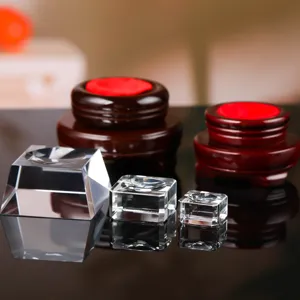 Crystal ball base square glass trapezoid stand and double layer wooden holder for display.