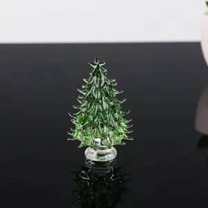 Handcrafted green crystal glass Christmas tree figurine, perfect desktop holiday decor.