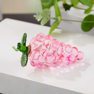 Exquisite pink crystal glass grape figurine detail, elegant desktop decoration craft.