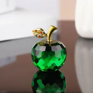 Exquisite green crystal apple figurine with gold stem and sparkling rhinestones for decor.