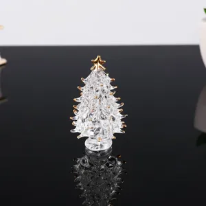 Crystal glass Christmas tree table ornament with gold accents, clear handmade festive decor.