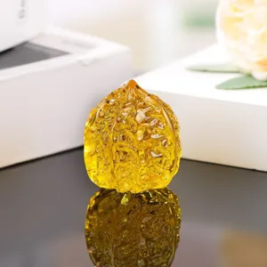 Amber colored glass walnut ornament, crystal clear toy for hand exercise and chic desk decoration.