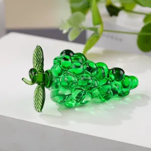 Green crystal glass grape ornament close up detail, elegant home decor craft sculpture.
