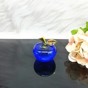Blue crystal apple figurine with gold rhinestone leaf, elegant desktop home decor gift.
