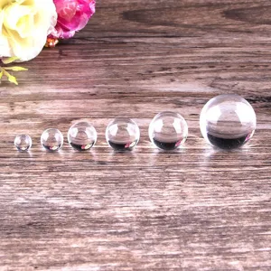 Clear glass crystal sphere balls detail display showing different product sizes here.