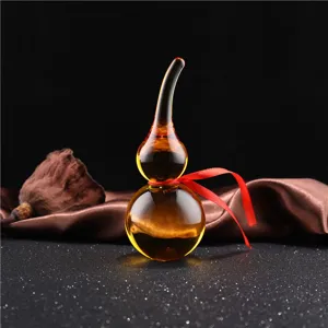 Crystal glass gourd ornament detail close up view decorative lucky feng shui piece.