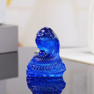 Blue crystal snake figurine detail showcasing exquisite scales and glossy finish for home decor.