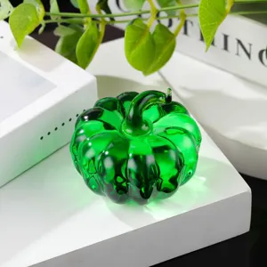 Green glass pumpkin ornament, crystal fruit figurine for office desktop and home decor display.