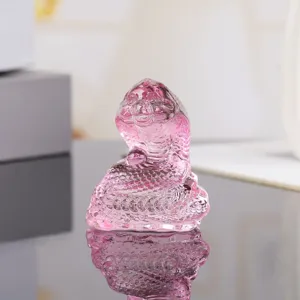 Exquisite crystal snake figurine, detailed glass animal ornament for home desktop decor.