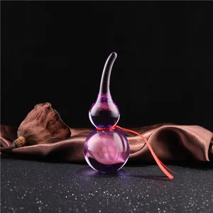 Purple crystal glass gourd ornament detail view, beautiful home decor for Feng Shui and wealth.