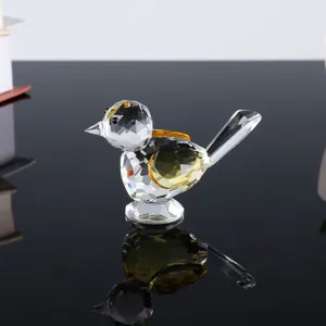 Exquisite crystal glass bird figurine detail showcasing multi-faceted sparkling crystal craft.