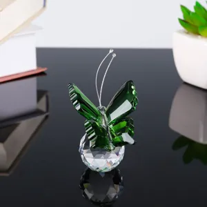 Detailed view of green crystal butterfly figurine on base, elegant crystal desktop decor gift.