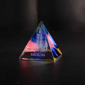 Crystal pyramid ornament with 3D laser engraved Barcelona architecture inside for home decor.