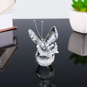 Exquisite crystal butterfly figurine detail view, clear glass ornament for modern home decor table.