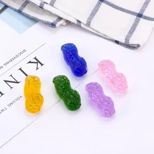 Colorful crystal peanut ornaments set, transparent glass decorative craft pieces for home decor.