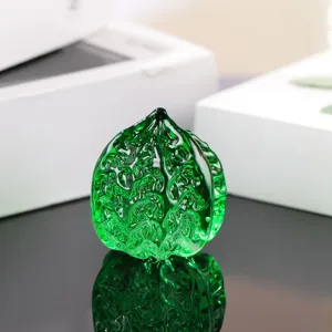 Green glass walnut figurine detail, translucent crystal hand piece ornament for desk display.