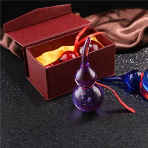 Detailed view of colorful crystal gourd ornament, exquisite feng shui home decor piece.