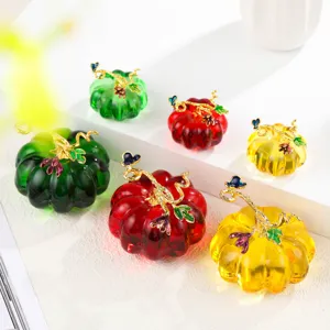 Exquisite colorful crystal glass pumpkin figurines set, elegant decorative table ornaments for home.