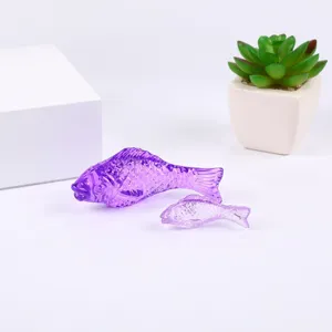 Purple crystal glass fish figurine set, elegant ornament for home decor and display.