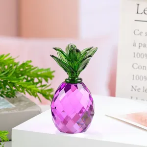 Detailed shot of a crystal pineapple ornament, purple glass fruit figurine for desktop decor.