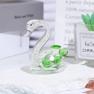 Crystal swan figurine with green crystal elements for home decor and romantic gifts.