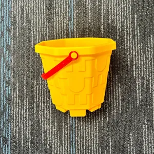 Children plastic beach bucket yellow with red handle castle pattern toy for sand outdoor fun