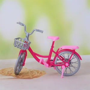 Miniature plastic bicycle model toy detail, pink and grey dollhouse decoration prop.
