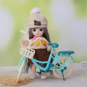 Fashion doll with miniature bicycle model toy set, cute knitted hat and sweater outfit.