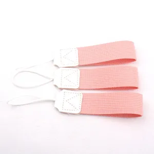 Detailed view of pink portable coffee cup lanyard strap, fabric carrying handle for tumblers.