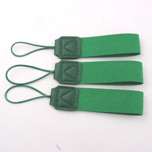 Green portable cup lanyard strap detail, durable fabric handle for travel bottles.