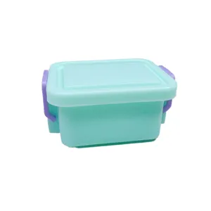 Miniature plastic storage box for dollhouse, cute mint green container with purple clips.