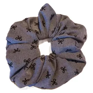 Grey fabric hair scrunchie with cute black bowknot print, stretchy elastic band for daily wear.