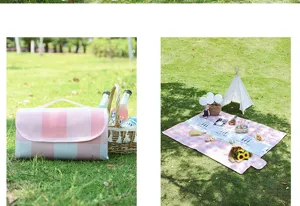 Detailansicht der tragbaren, wasserdichten Outdoor-Picknickdecke im Rosa-Blau-Karomuster.