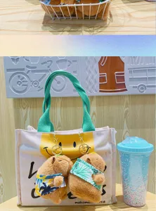 Adorable porte-clés en peluche capybara avec sac cabas en toile, pendentif de sac.