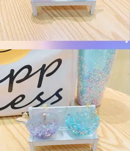 Cute cartoon liquid quicksand whale keychain pendant, perfect gift accessory for keys.