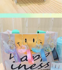 Cute cartoon whale liquid glitter keychain with strap, perfect bag pendant gift and accessory.