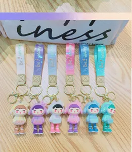 Electroplated changing outfit cartoon girl keychain, cute couple bag pendant accessories.