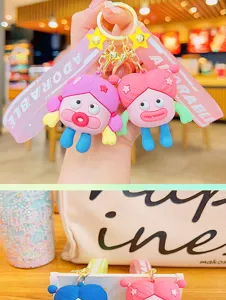 Cute funny girl keychain silicone doll pendant bag charm detail view, perfect daily accessory.