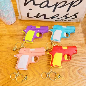 Set portachiavi pistola giocattolo decompressione colorato, simpatico ciondolo metallo