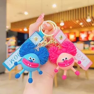 Porte-clés Figurine Cartoon Dudu Cheveux Explosifs Pendentif de Sac en PVC Avec Lanière à Lettres Poupée Mignonne