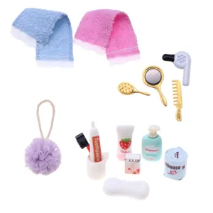Dollhouse miniature bathroom vanity accessories set including hair dryer, comb, and soap.