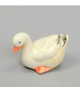 Figura de pato de ceramica reposa palillos, adorno de animal de porcelana blanca para mesa.