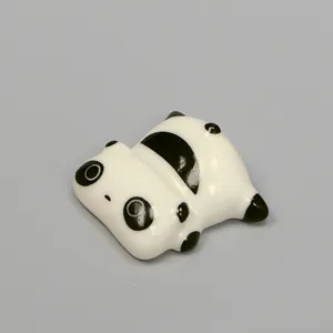 Bonito soporte de cerámica para palillos con diseño de panda, decoración de mesa creativa.