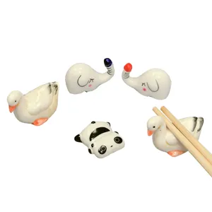 Bonito juego de soporte para palillos de cerámica, pato elefante panda decoración.