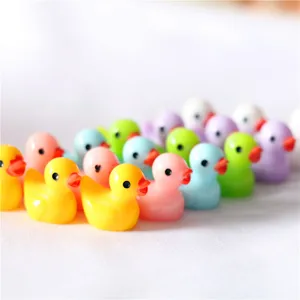 Colorful resin little duck miniature figurines for succulent landscape and DIY crafts decor.