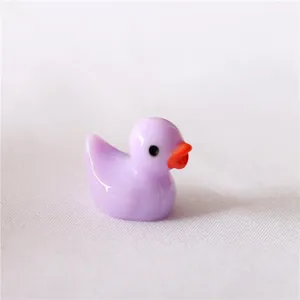 Mini purple resin duck figurine, cute animal charm for micro landscape and phone case DIY.