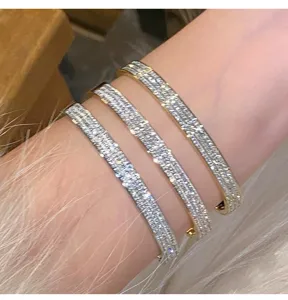 Elegant stacked cubic zirconia titanium steel bangles for women, shiny luxury jewelry.