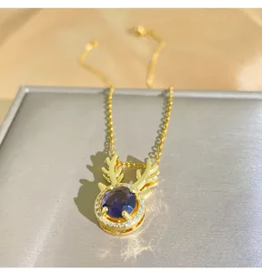 Exquisite purple zircon gold-plated titanium steel necklace with elegant deer antler pendant.